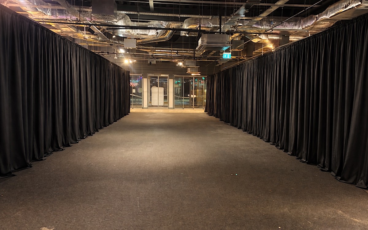 Black wall drapes Black wall drapes for a holiday park install